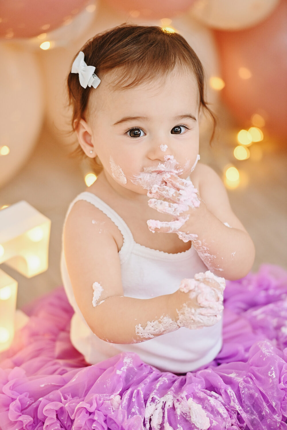 Servizio fotografico Smash Cake Brindisi bimba primo compleanno con torta