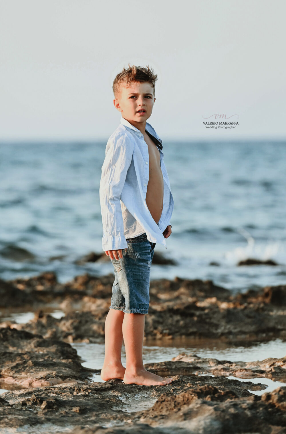 Fotografia artistica bambini sulla spiaggia di Brindisi stile reportage